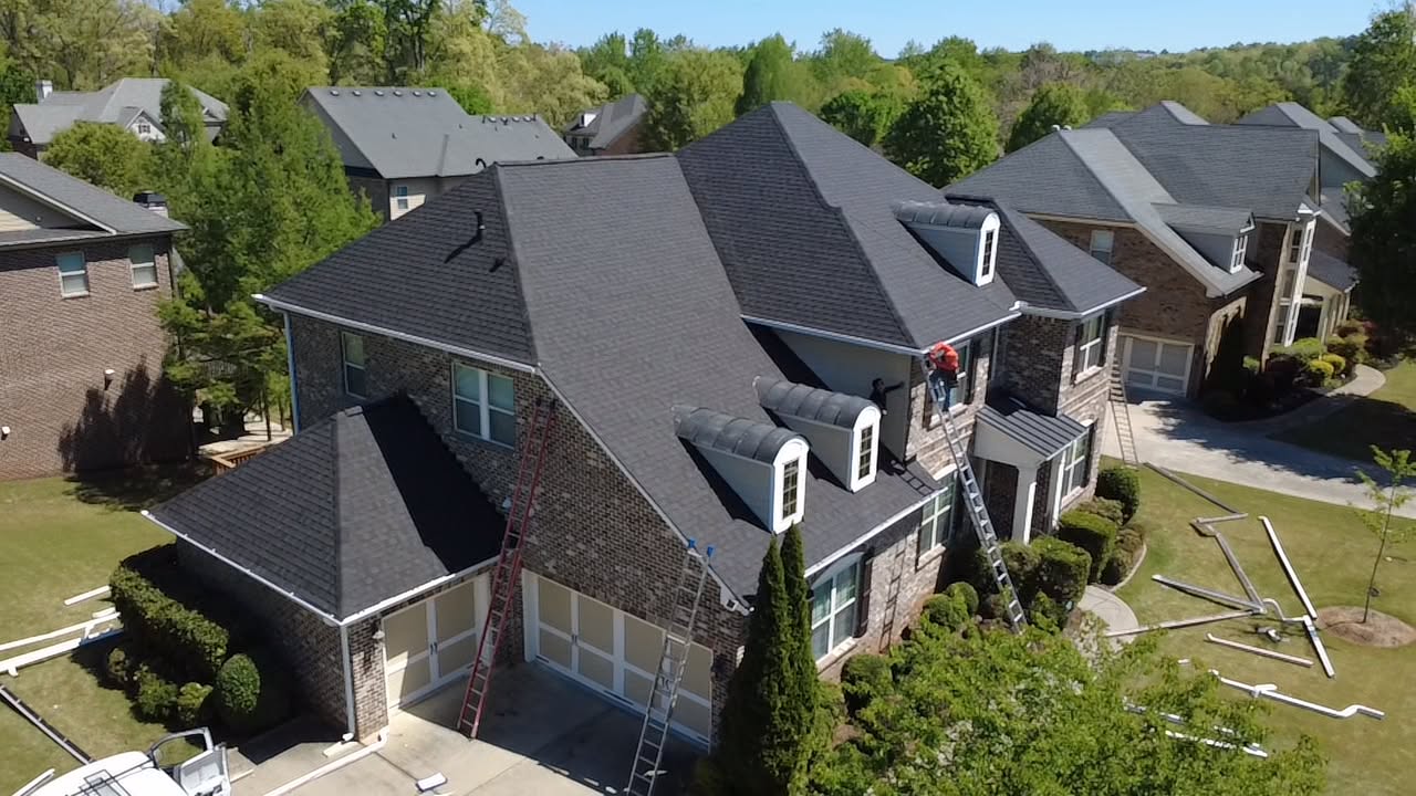 Aerial view of Titan crew replacing a residential roof