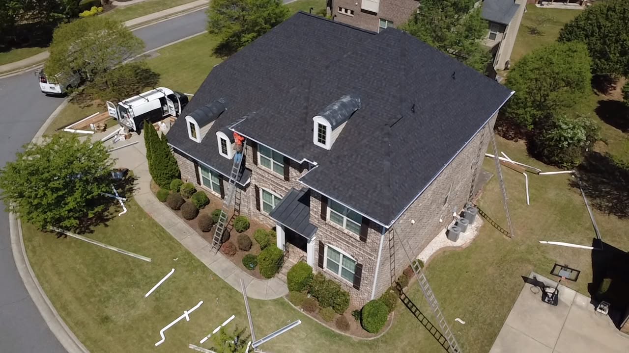 Aerial view of a roof replacement in progress