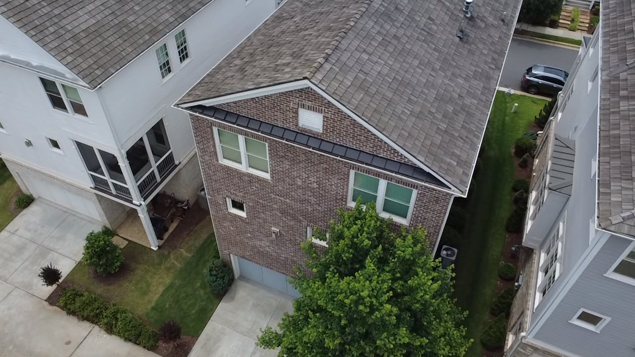 Close aerial of dark architectural shingles